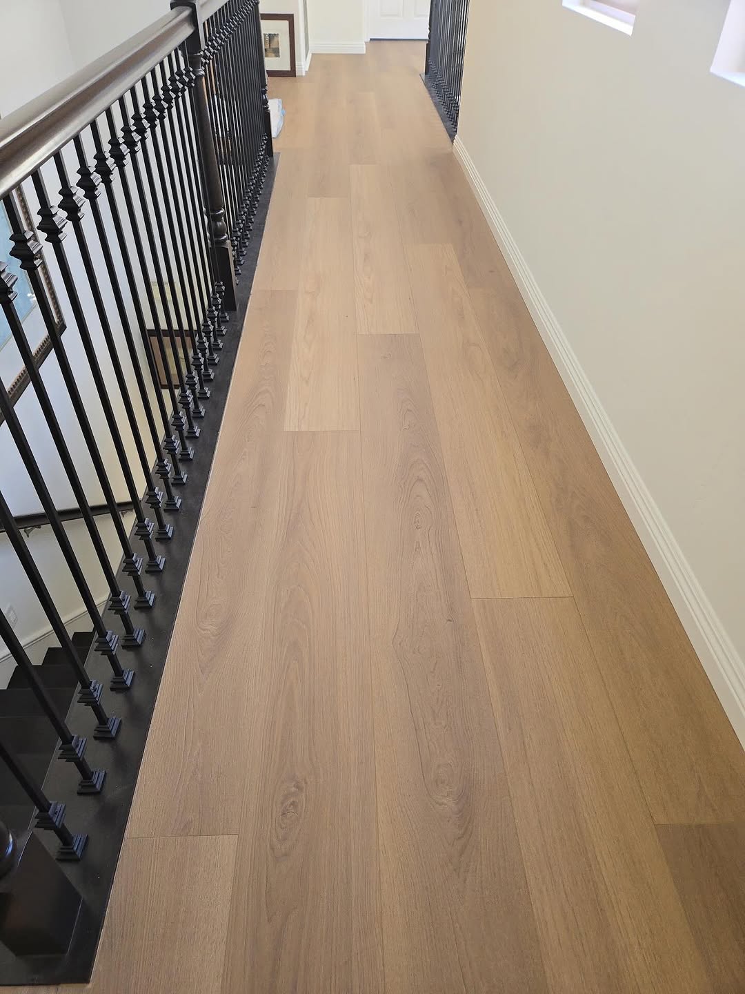 Laminate Flooring Installed with Precision and Clean, Smooth Finishing